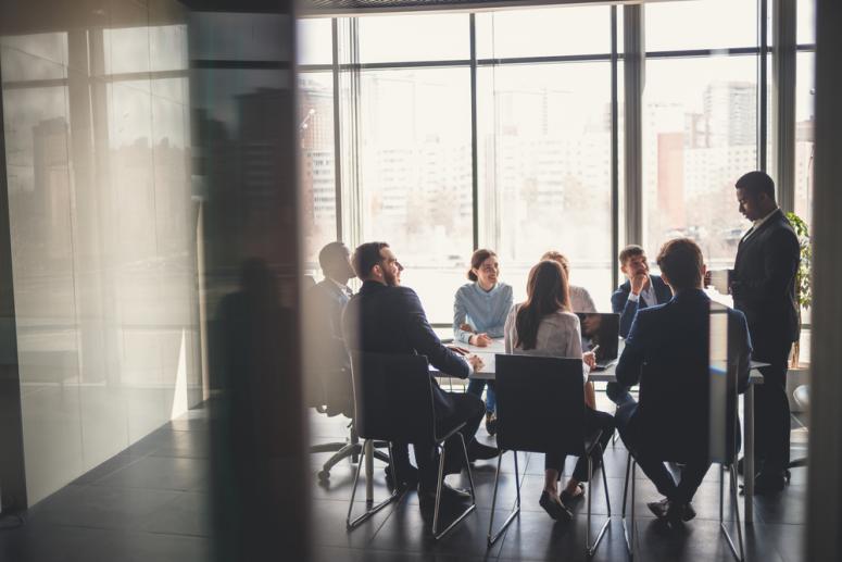 Team collaborating in conference room