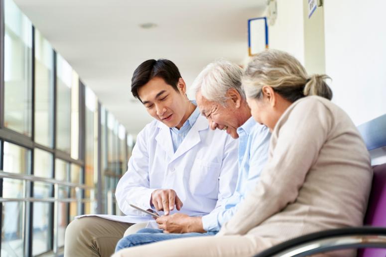 Elderly couple and patient