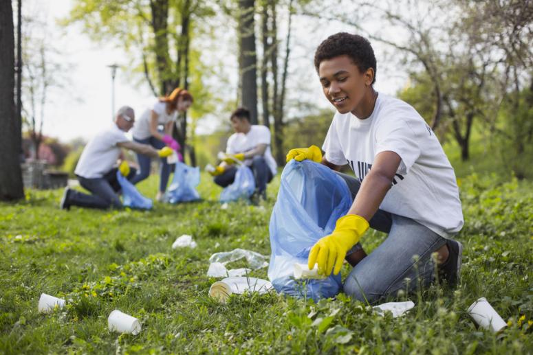 community members cleaning a mpark