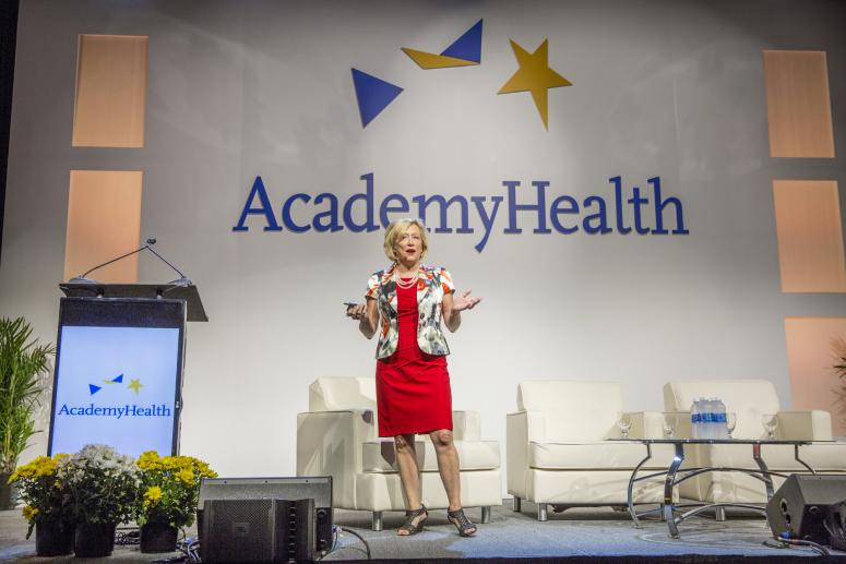AcademyHealth CEO Lisa Simpson presenting
